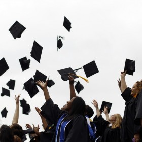 graduation-caps-in-the-air